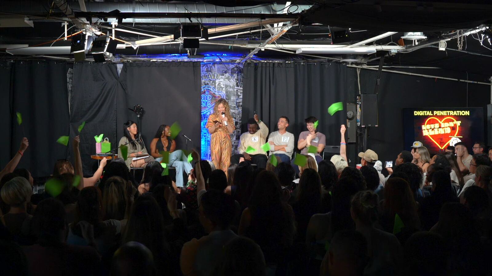 Green paddles up all over the room